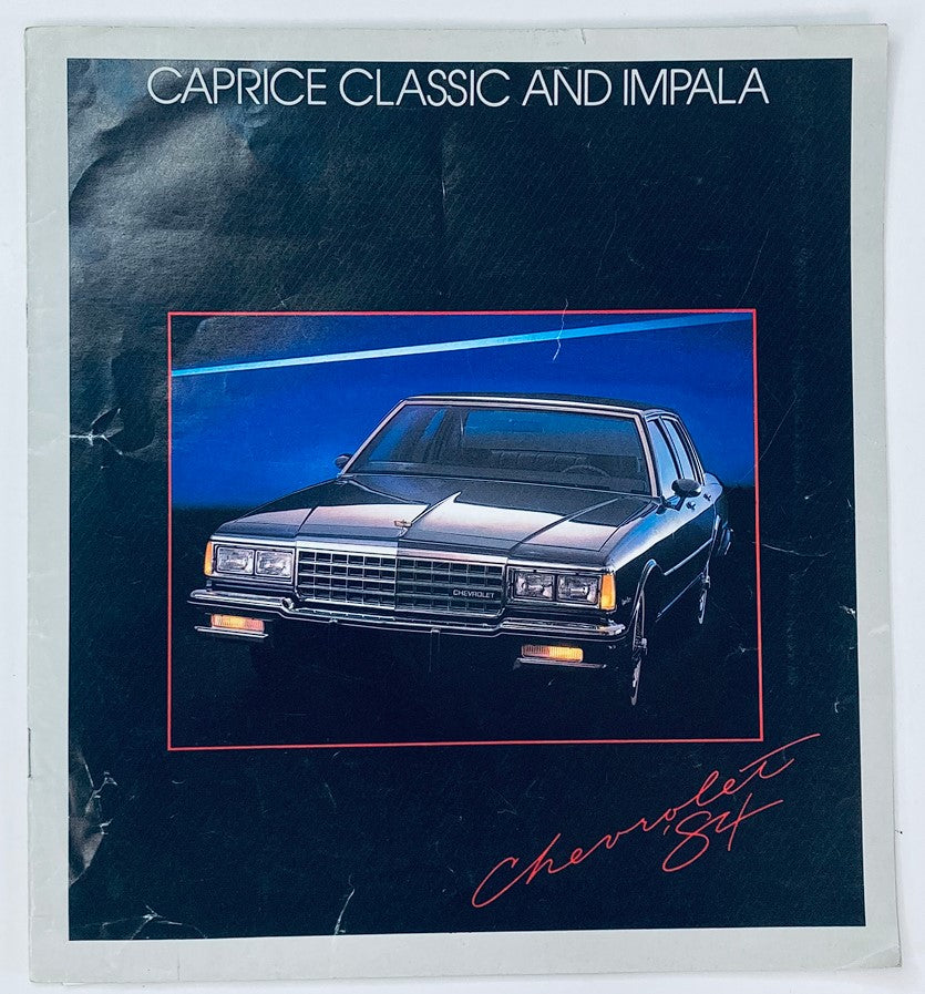 1984 Chevrolet Caprice Classic Dealer Showroom Sales Brochure showcasing the Caprice Classic and Impala models with an artistic background.