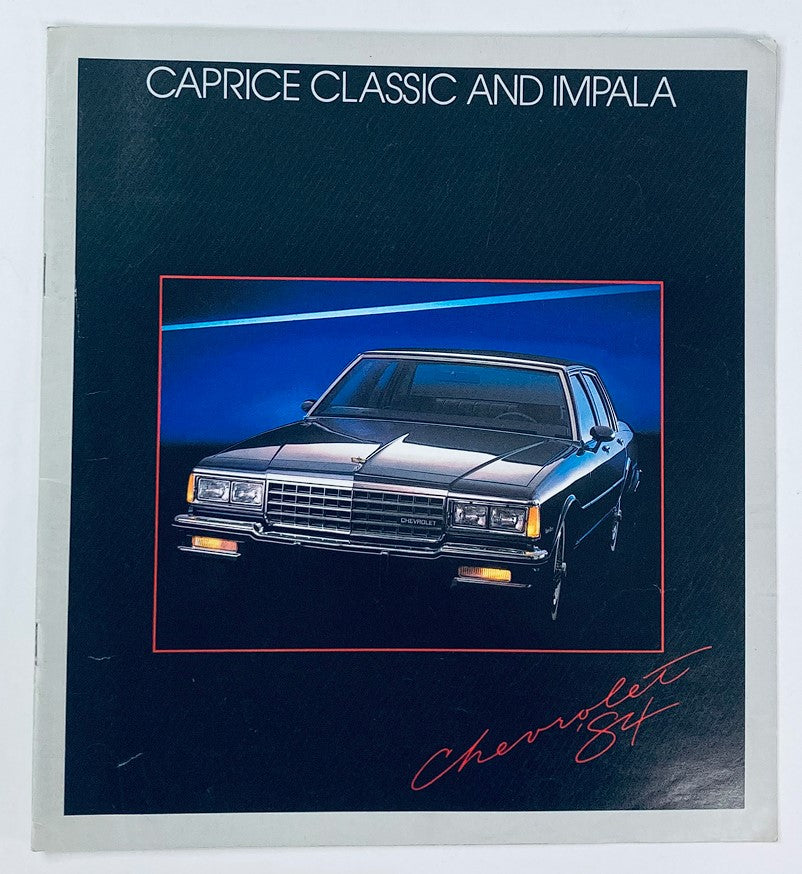 1984 Chevrolet Caprice Classic Dealer Showroom Sales Brochure featuring a detailed illustration of the Caprice Classic and Impala model with a sleek black car on the cover.