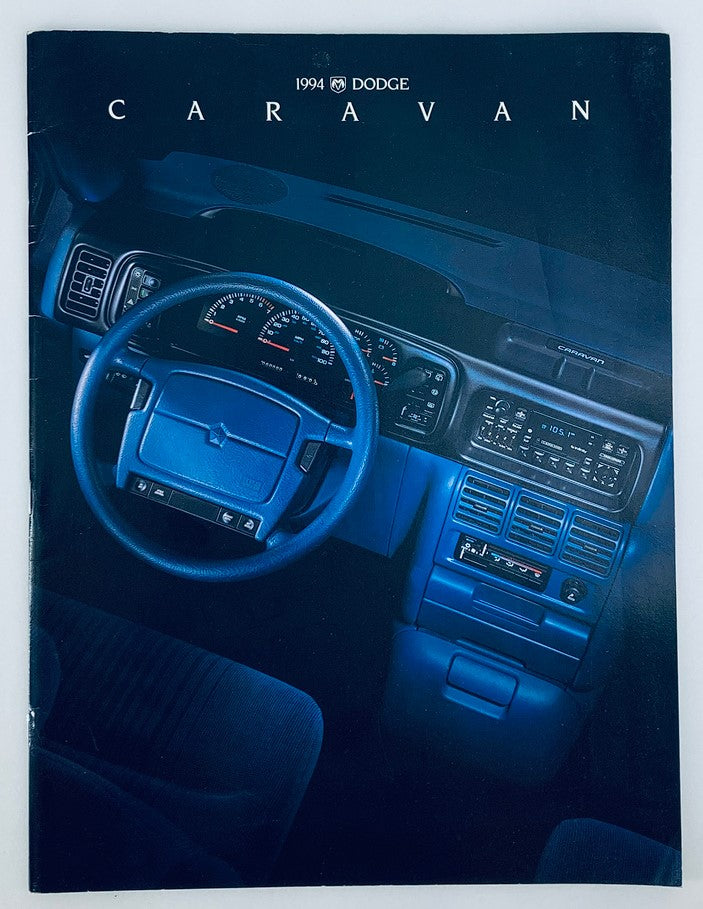 1994 Dodge Caravan Dealer Showroom Sales Brochure showcasing the interior dashboard and controls of the vehicle, emphasizing its sleek design and modern features.