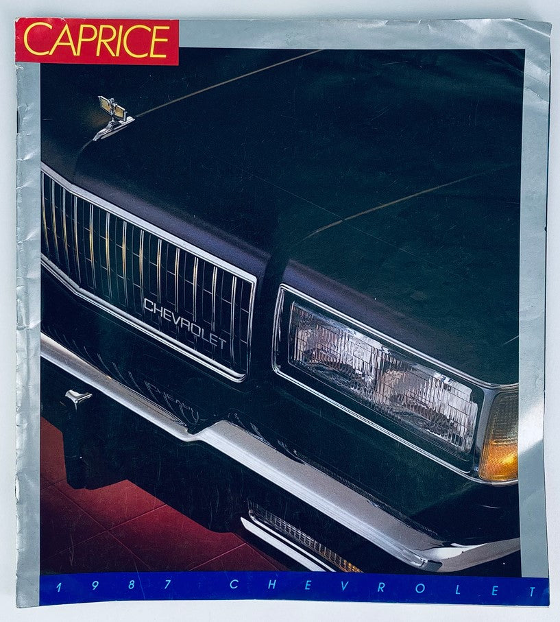 Cover image of the 1987 Chevrolet Caprice Dealer Showroom Sales Brochure Guide Catalog, featuring the front grille of a Chevrolet Caprice in a professional layout.