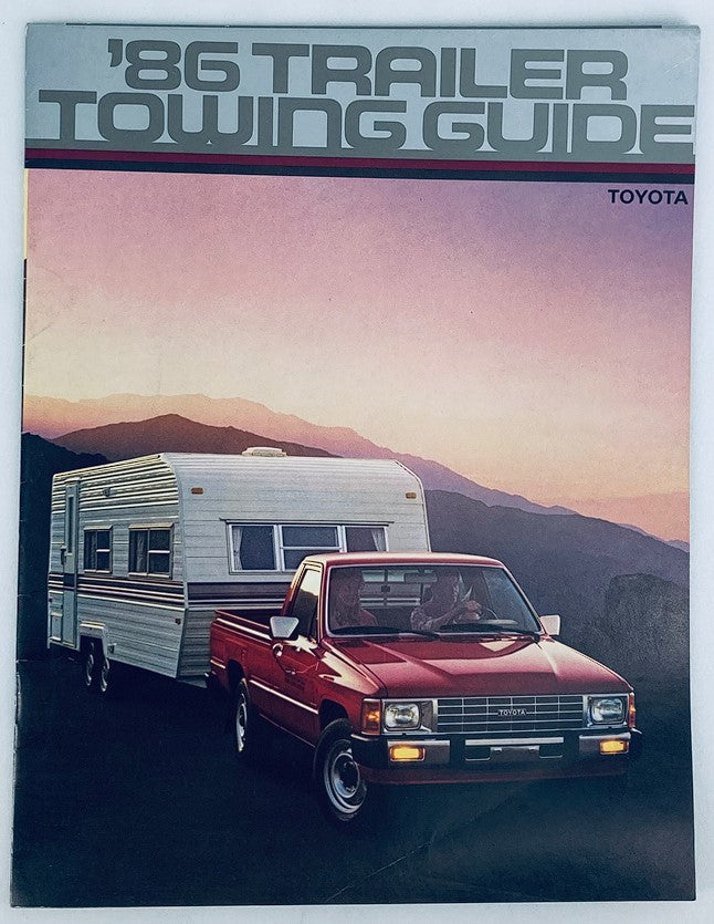 1986 Toyota Trailer Towing Dealer Showroom Sales Brochure Guide Catalog cover featuring a red Toyota truck towing a camper trailer against a mountain backdrop, showcasing the towing capacity and design for trailers.