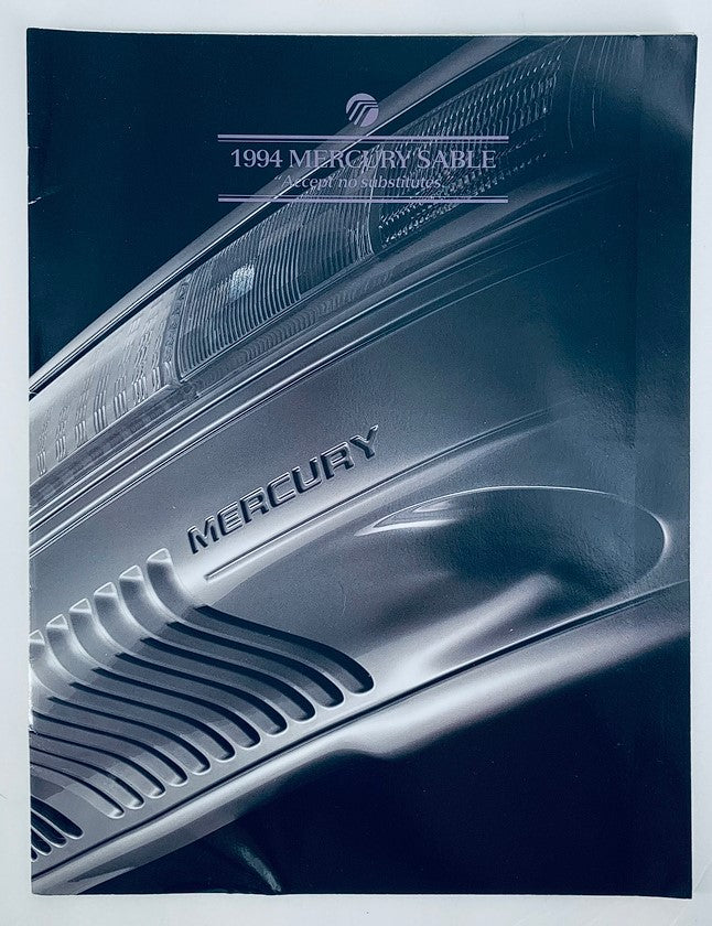1994 Mercury Sable Dealer Showroom Sales Brochure showcasing the vehicle's sleek design with a close-up of the Mercury logo.