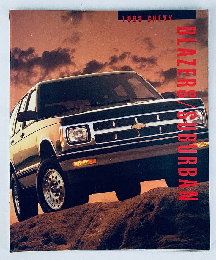 1993 Chevrolet Blazer & Suburban Dealer Showroom Sales Brochure showcasing the front view of a black Chevrolet vehicle against a dramatic sunset background, highlighting its design features.