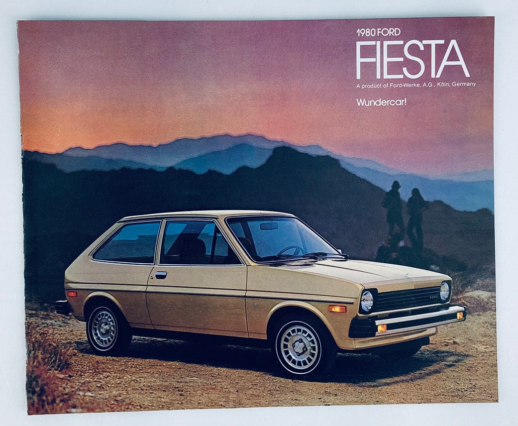1980 Ford Fiesta Dealer Showroom Sales Brochure Guide Catalog featuring a side view of a bronze 1980 Ford Fiesta parked with a scenic mountain background.