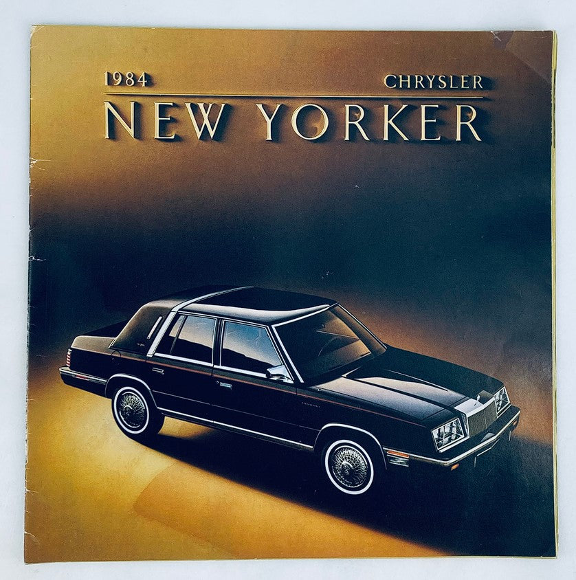 1984 Chrysler New Yorker Dealer Showroom Sales Brochure showcasing the classic car's elegant design and luxurious features.