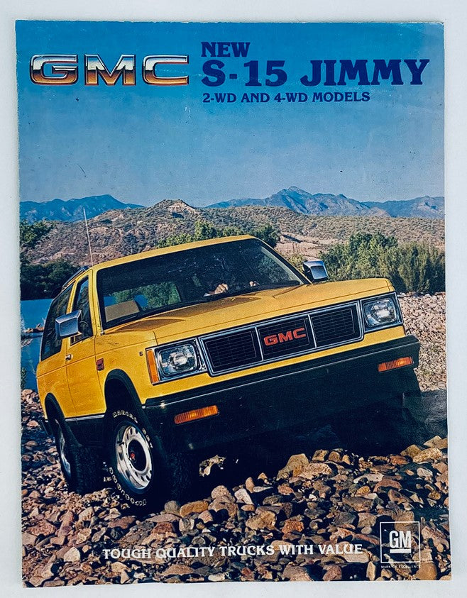1983 GMC S-15 Jimmy Dealer Showroom Sales Brochure Guide Catalog featuring a yellow GMC S-15 Jimmy parked on rocky terrain with mountains in the background, highlighting its 2-wheel and 4-wheel drive options.