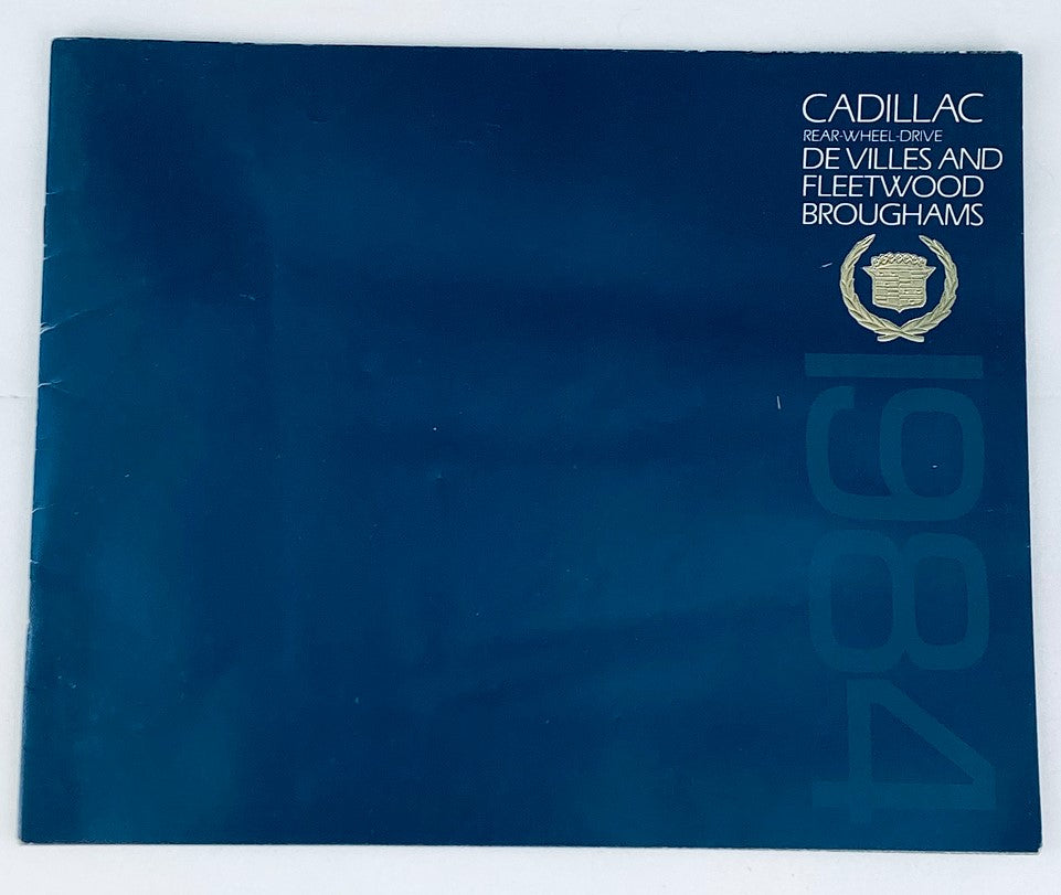Front cover of the 1984 Cadillac De Villes & Fleetwood Dealer Showroom Sales Brochure Guide Catalog featuring the title and emblem.