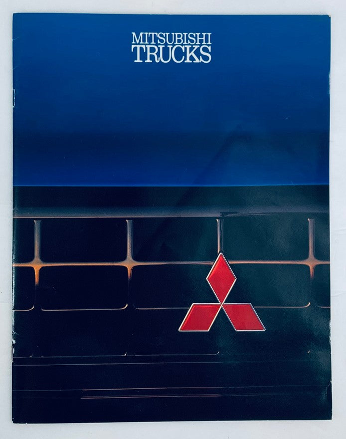 Cover of the 1991 Mitsubishi Trucks Dealer Showroom Sales Brochure Guide Catalog, featuring a prominent Mitsubishi logo against a dark background.