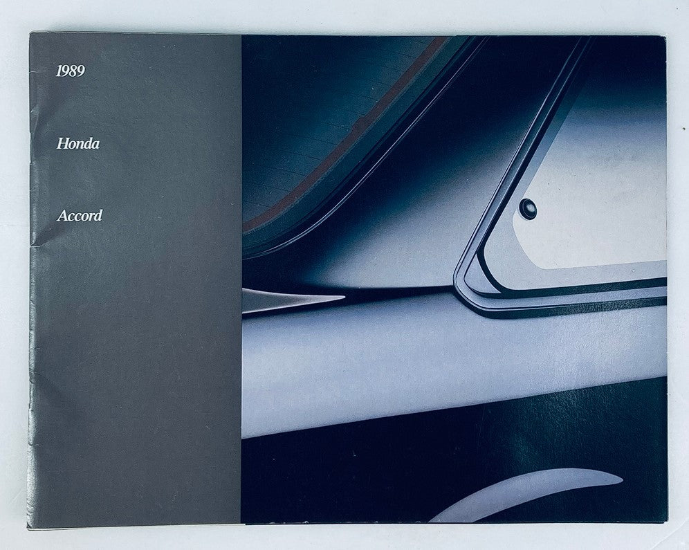 Cover of the 1989 Honda Accord Lineup Dealer Showroom Sales Brochure Guide Catalog featuring a sleek design with the text '1989 Honda Accord' prominently displayed, highlighting the automotive styling.