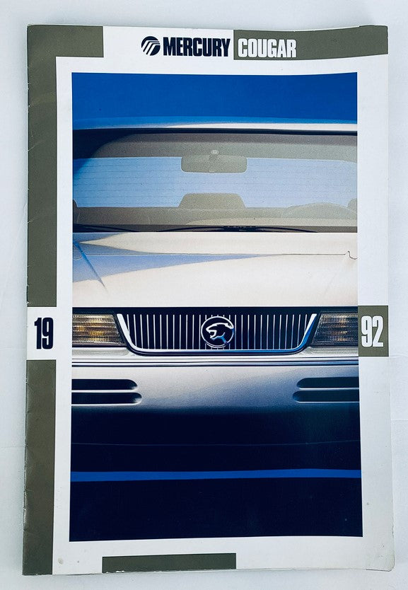 1992 Mercury Cougar Dealer Showroom Sales Brochure featuring the front view of the vehicle showcasing its sleek design.