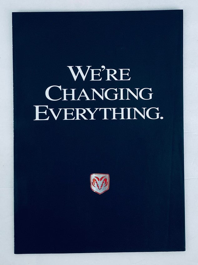 Cover of the 1993 Dodge Lineup Dealer Showroom Sales Brochure Guide Catalog featuring the bold statement 'We're Changing Everything' with the Dodge logo, showcasing an influential piece of automotive history.