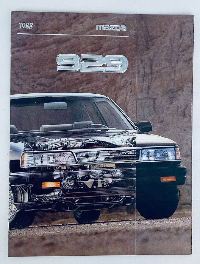 1988 Mazda 929 Dealer Showroom Sales Brochure featuring a sleek black Mazda 929 car design, showcasing its exterior features and styling, part of a promotional catalog for potential buyers.
