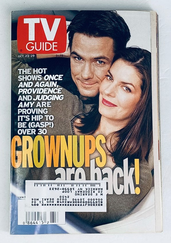 TV Guide Magazine from October 23, 1999, featuring Billy Campbell and Sela Ward on the cover, highlighting popular TV shows of the late '90s.