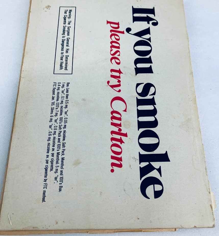 Back cover of TV Guide Magazine July 13 1985 featuring an advertisement that states 'If you smoke please try Carlton.' It includes health warnings about smoking and details regarding cigarette specifications.