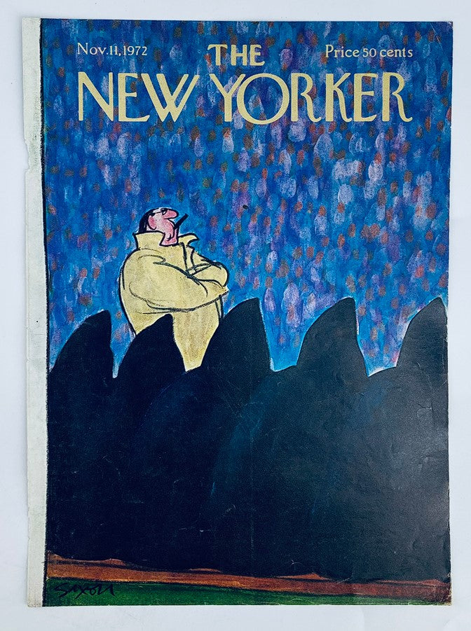 Cover of The New Yorker dated November 11, 1972, titled 'Man on a Hill' by Charles Saxon, depicting a contemplative figure surrounded by dark silhouettes against a vibrant blue and purple backdrop.