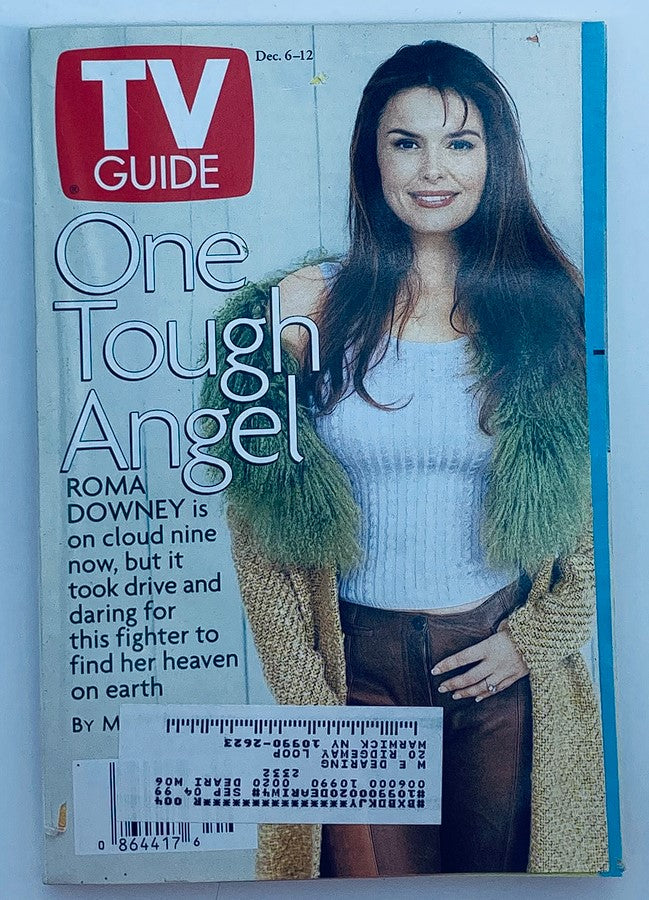 Cover of TV Guide Magazine dated December 6, 1997, featuring Roma Downey from the series One Tough Angel, highlighting her engaging smile and stylish attire, reflecting the vintage television era.