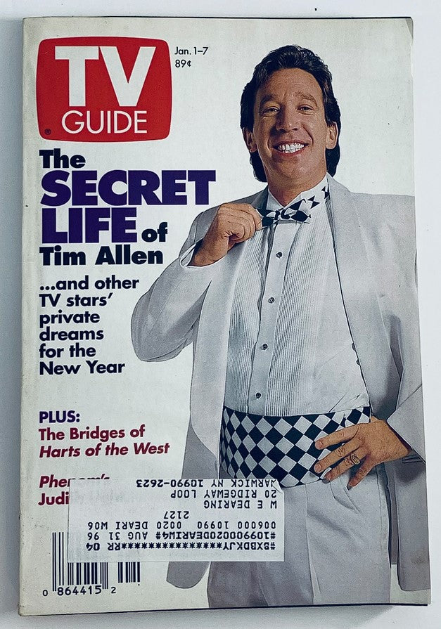 Cover of TV Guide Magazine January 1, 1994 featuring the title 'The Secret Life of Tim Allen', showcasing Tim Allen in a stylish white suit with a checkered bow tie, symbolizing television history and nostalgia.