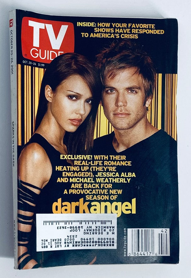 TV Guide Magazine cover from October 20, 2001 featuring Jessica Alba and Michael Weatherly, promoting the TV show Dark Angel, with headlines that discuss their real-life romance and the new season.