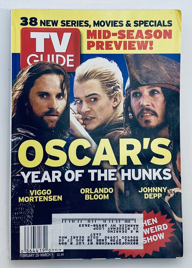 TV Guide Magazine February 28 2004 featuring Orlando Bloom, Johnny Depp, and Viggo Mortensen. This collectible issue highlights the star power of these actors with the theme 'Oscar's Year of the Hunks,' showcasing entertainment trends from the early 2000s.