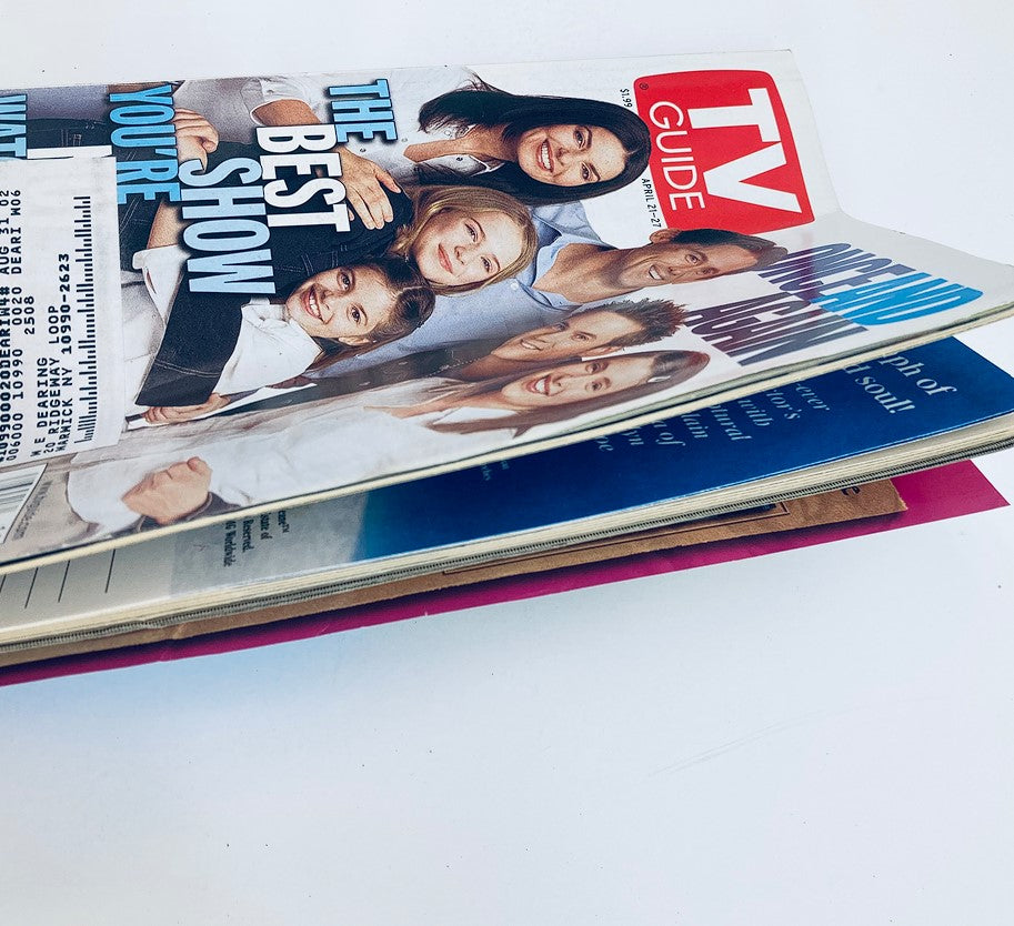 Side view of TV Guide Magazine April 21 2001 showcasing the cast of 'Once and Again' along with magazine details, emphasizing its collectible nature and early 2000s television nostalgia.