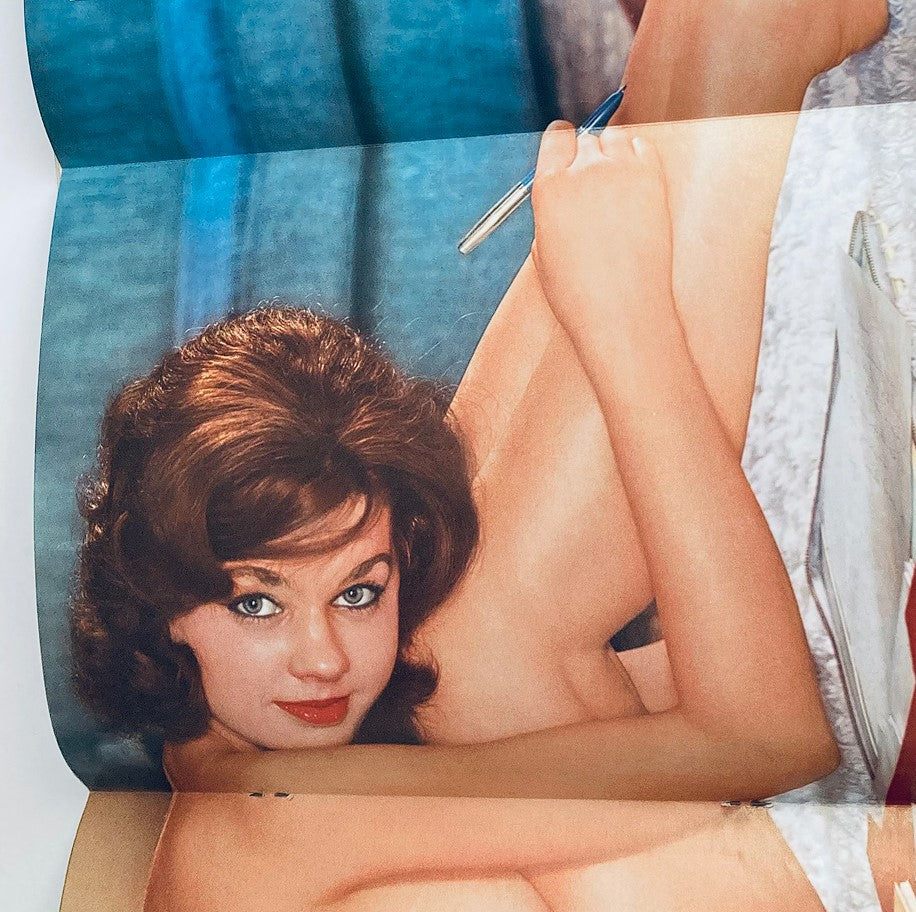 Inside layout of the VTG Playboy Magazine April 1961 featuring a detailed image of Nancy Nielsen, capturing the classic artistry and nostalgic essence.