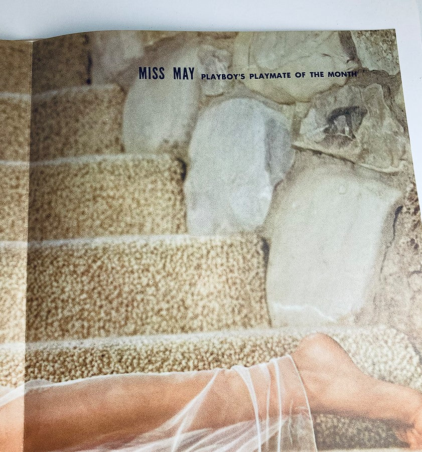 VTG Playboy Magazine May 1961 featuring Miss May, Playboy's Playmate of the Month with artistic depiction of her leg against a textured background.