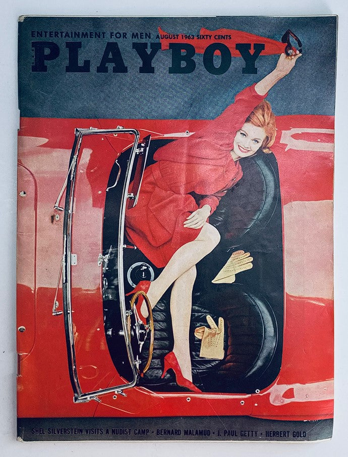 Cover of VTG Playboy Magazine August 1963 featuring a glamorous woman in a red dress sitting in a classic convertible car, representing vintage magazine culture.