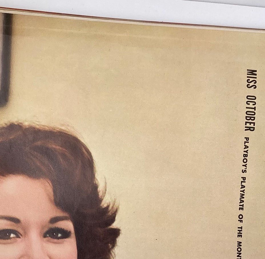 Close-up of VTG Playboy Magazine October 1959 showcasing Elaine Reynolds as Miss October, highlighting her classic beauty and historic relevance.