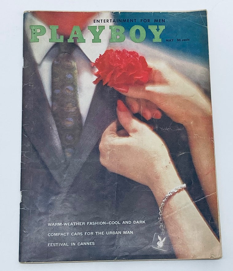 Cover of VTG Playboy Magazine May 1960 featuring stylish design and aesthetics, showcasing Miss May Ginger Young.