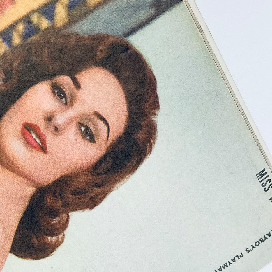 VTG Playboy Magazine August 1960 featuring Miss August Elaine Paul, presenting a close-up of her glamorous hairstyle and makeup.