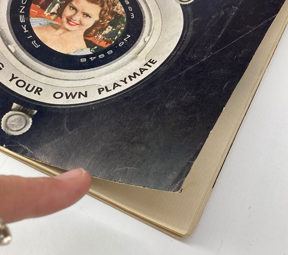 Close-up view of the cover of VTG Playboy Magazine June 1958 highlighting Judy Lee Tomerlin's centerfold section.