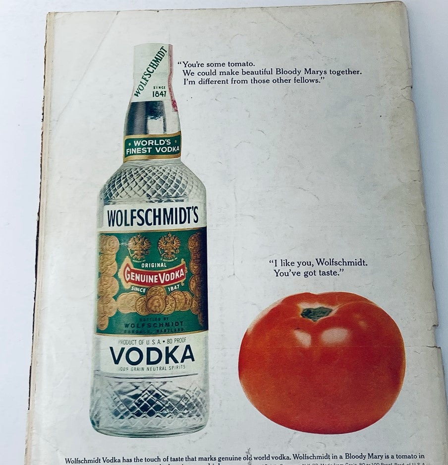 Back cover of Vintage Playboy Magazine November 1961 showcasing an advertisement for Wolfschmidt's vodka with a humorous dialogue.