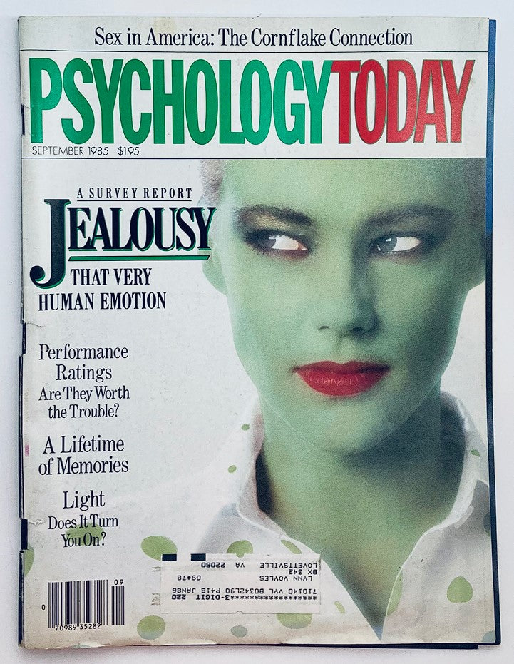 Cover of Psychology Today magazine, September 1985, featuring the title 'Jealousy: That Very Human Emotion.' The cover showcases a model with green skin and bold red lips, highlighting the theme of jealousy with intriguing articles.