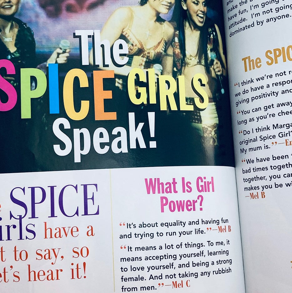 Page from Scholastic 1998 Your Unofficial Guide To Everything Spice featuring the Spice Girls with colorful text highlighting their quotes on girl power and equality.
