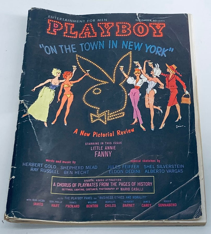 VTG Playboy Magazine November 1962 cover featuring colorful illustration of women, iconic Playboy logo, and advertisements, showcasing the vintage appeal of classic literature and pop culture.