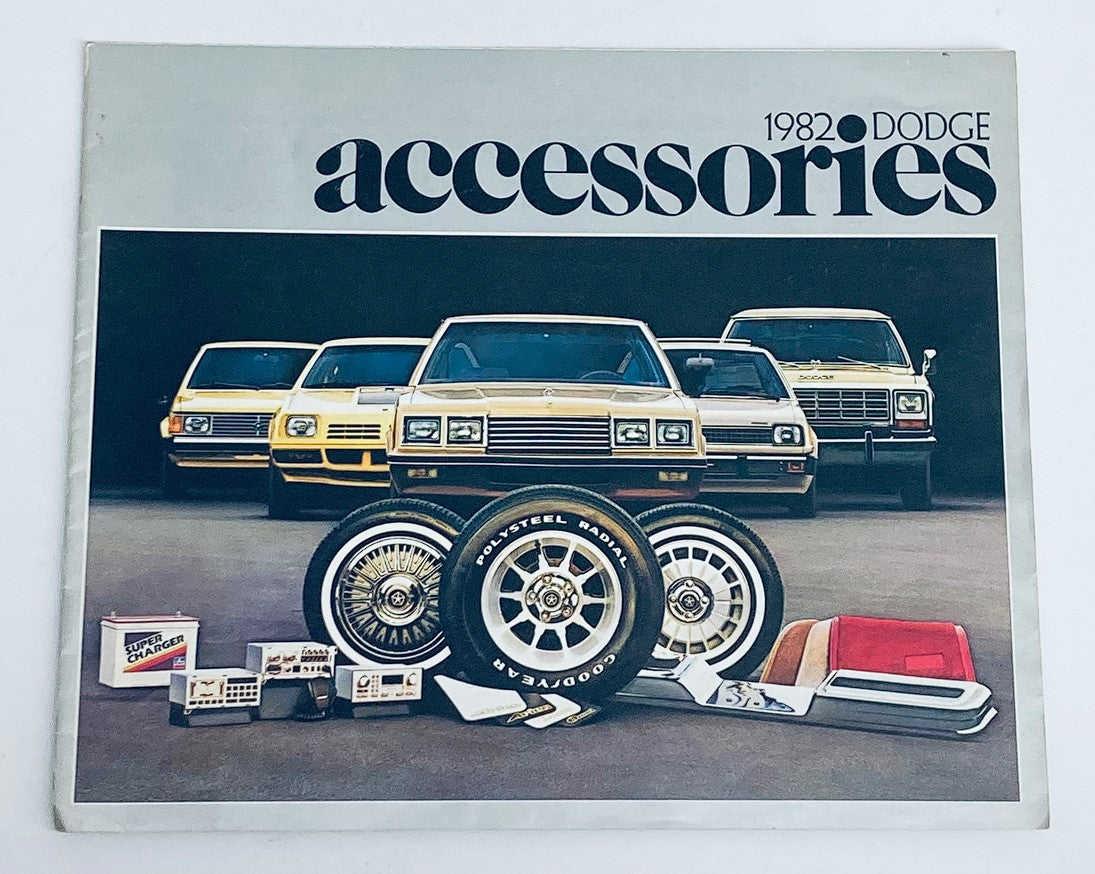 1982 Dodge Accessories Dealer Showroom Sales Brochure Catalog featuring various Dodge vehicles and accessories displayed prominently on the cover.