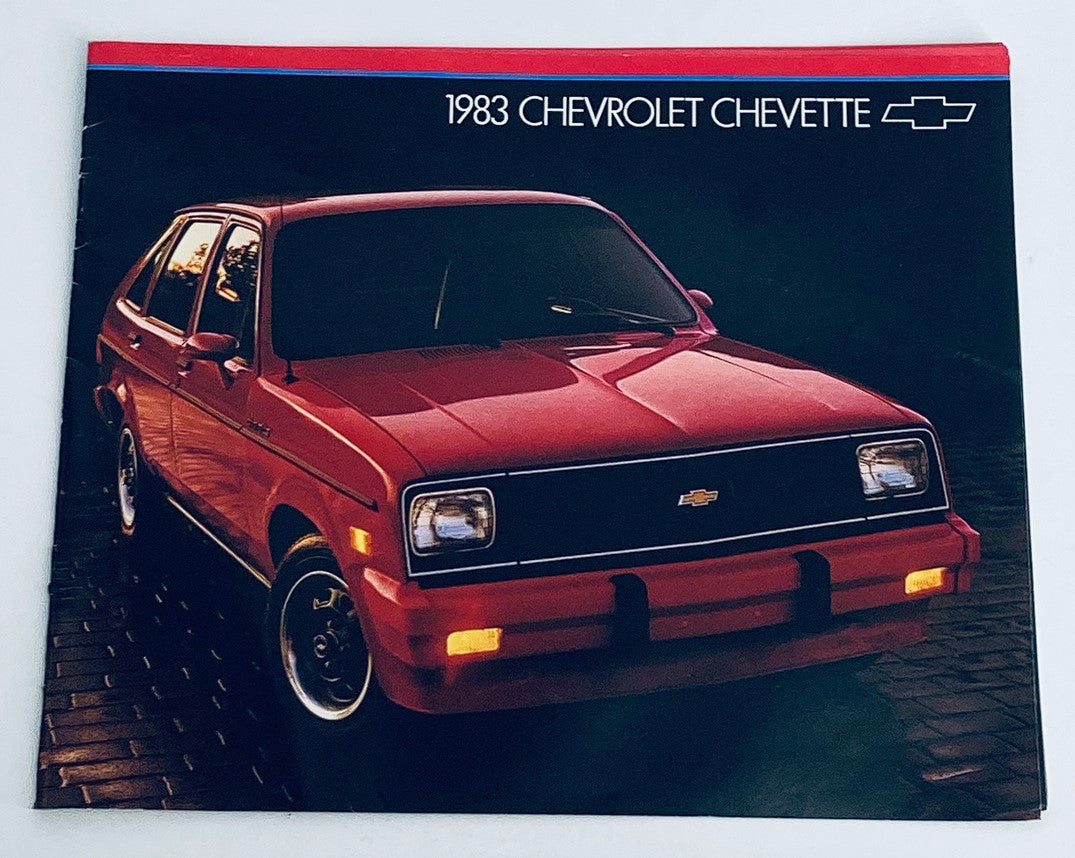 1983 Chevrolet Chevette Dealer Showroom Sales Brochure showcasing a red Chevrolet Chevette car in an urban environment.