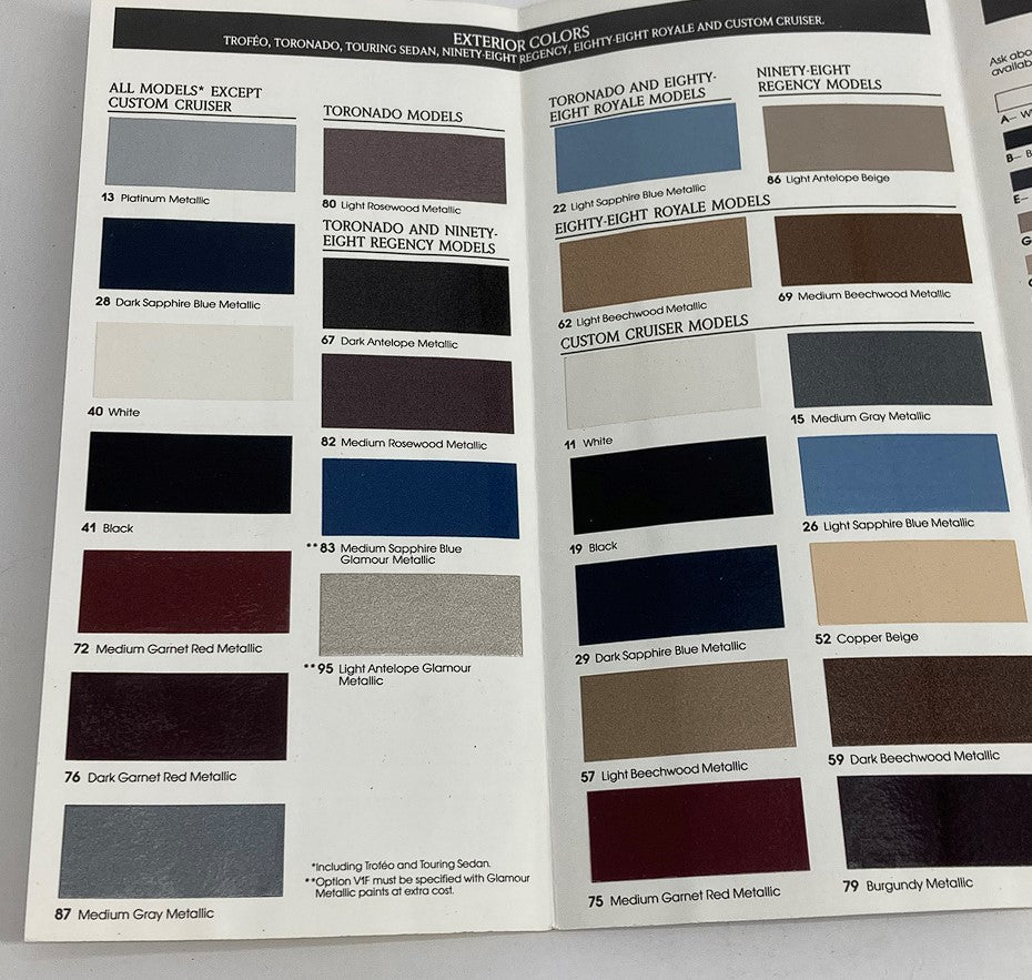 1989 Oldsmobile Trofeo, Toronado Dealer Showroom Sales Brochure showcasing exterior color options for models including Trofeo, Toronado, and Custom Cruiser.