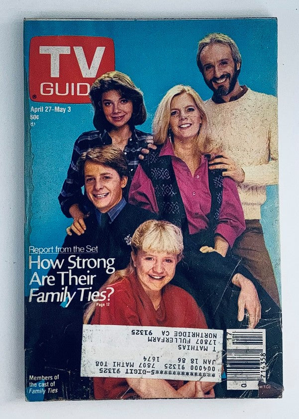 TV Guide Magazine April 27, 1985 cover featuring the cast of 'Family Ties' including Justine Bateman and Meredith Baxter. The image showcases the friendly poses of the actors against a vibrant background, highlighting this vintage collectible from the 80s.