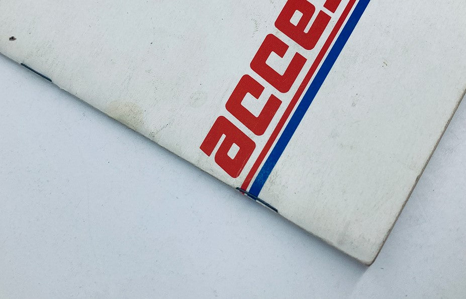 Close-up view of the 1990 Lincoln-Mercury Accessories Dealer Showroom Sales Brochure Catalog cover showing the word 'accessories' in bold red letters with blue accents.