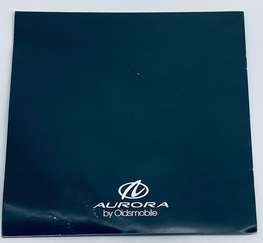Back cover of the 1995 Oldsmobile Aurora Lineup Dealer Showroom Sales Brochure Catalog featuring the Aurora by Oldsmobile logo.