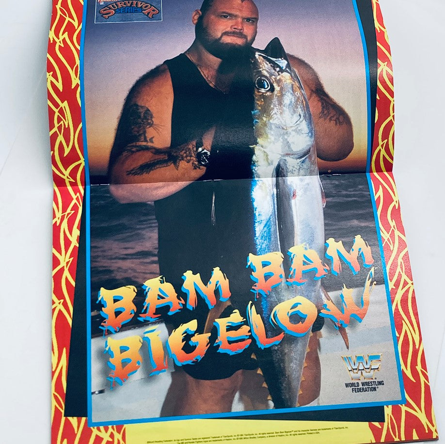 Fold-out poster from the WWF World Wrestling Federation Magazine November 1995 displaying Bam Bam Bigelow holding a large fish, showcasing wrestling memorabilia.