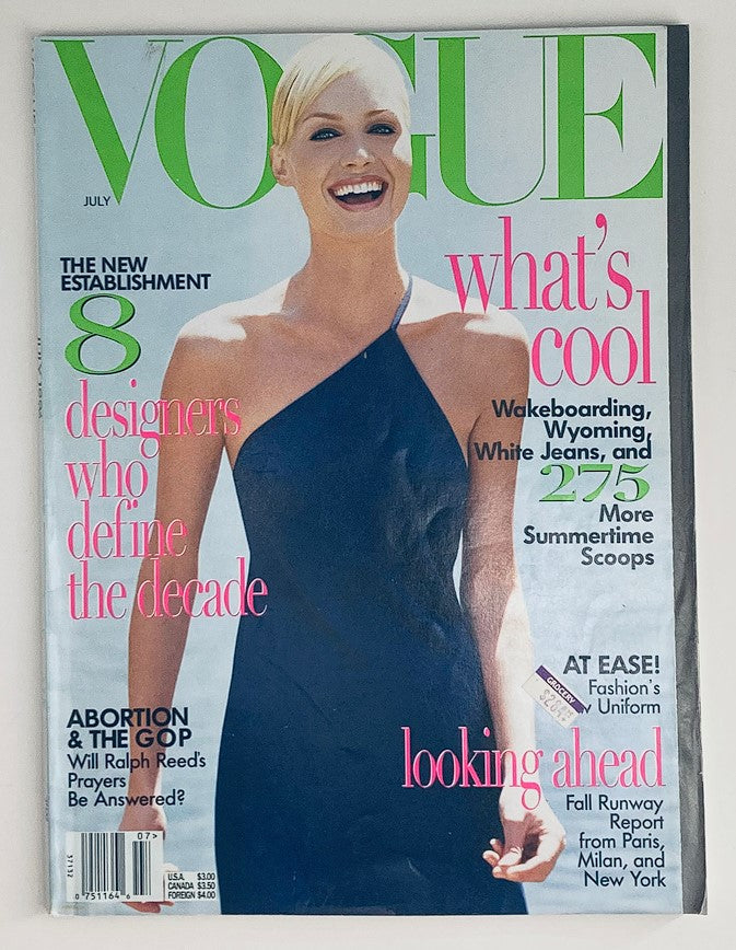 Vogue Magazine July 1996 featuring Amber Valletta on the cover, photographed by Steven Meisel, showcasing an elegant fashion design and vibrant colors, ideal for collectors and fashion enthusiasts.