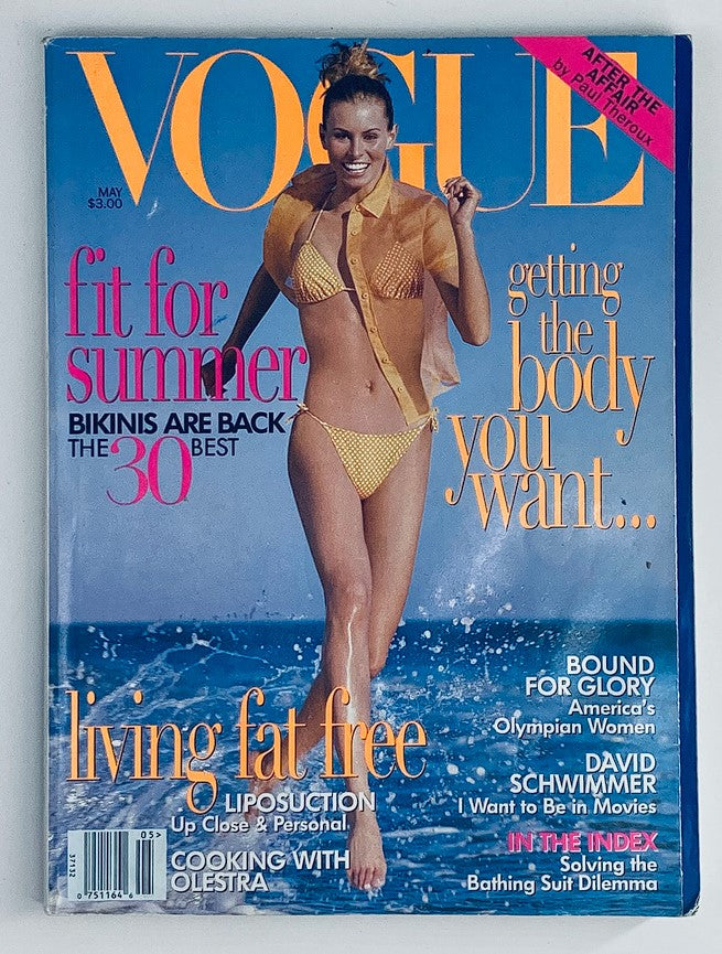 Vogue Magazine May 1996 featuring Niki Taylor on the cover, showcasing a stylish swimsuit and highlighting articles on summer body fitness and celebrity culture.