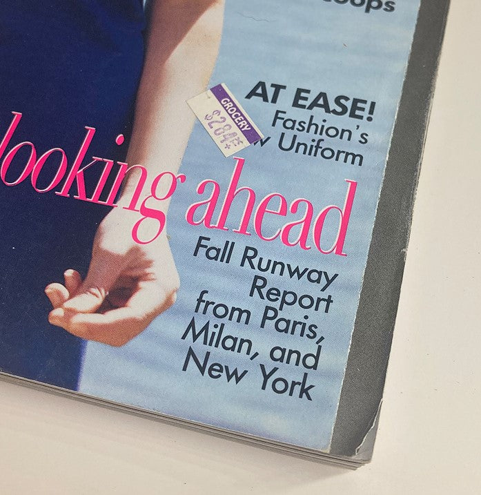 Vogue Magazine July 1996 cover detail featuring 'Looking Ahead' text and Fall Runway Report from Paris, Milan, and New York, showcasing fashion trends and styles.