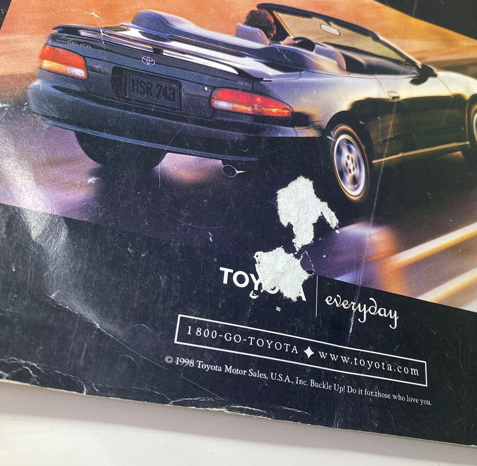 Close-up of the back cover of InStyle Magazine June 1998 displaying a sleek Toyota Celica convertible, accompanied by promotional text for Toyota vehicles.