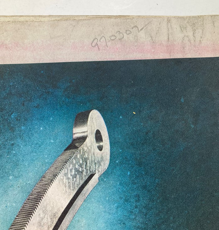 The Saturday Evening Post November 18 1944 Gun Factory Cover by Robert Riggs, zoomed-in view of a metallic part associated with an advertisement for General Mills, set against a blue backdrop.