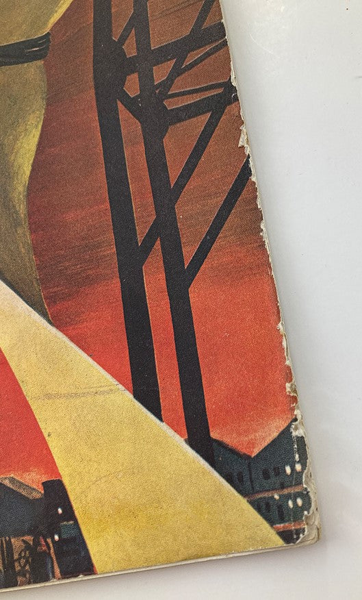 Close-up of the edge of The Saturday Evening Post February 26 1944 cover showcasing minor wear and tear, including creases and rips, which add to its vintage character.