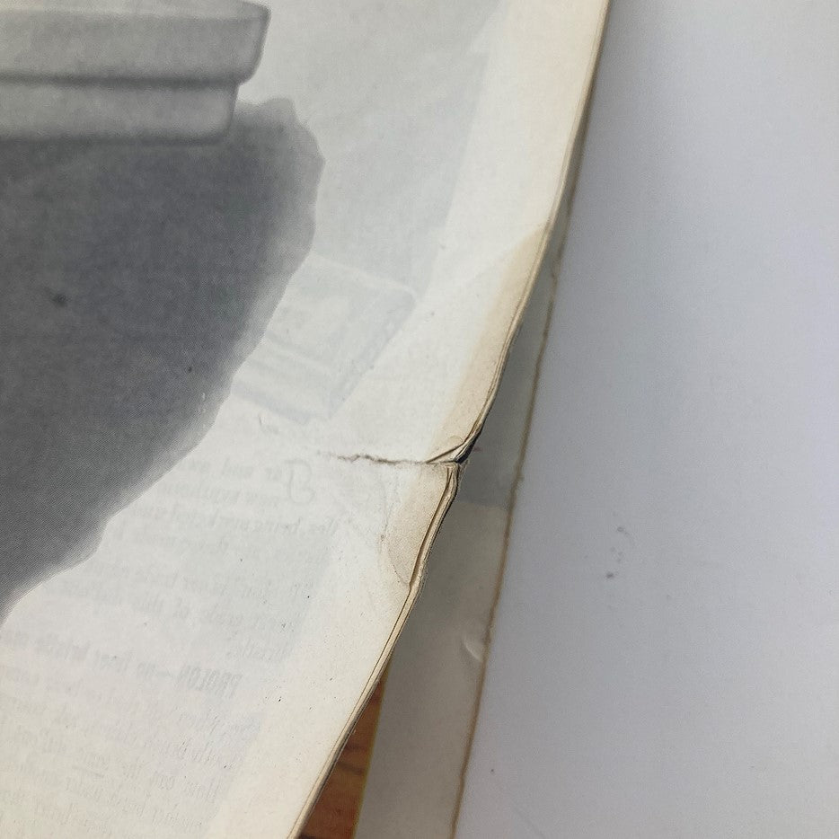 Close-up view of the spine of The Saturday Evening Post from July 27, 1946, highlighting visible wear and tear on the magazine containing the article 'The Black Market Broke Us' by Celia F.