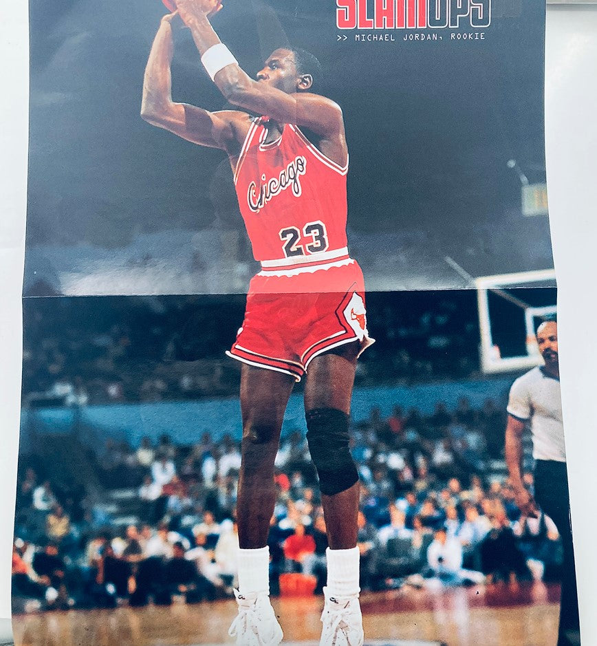 Special poster included in Slam Magazine November 2001 featuring Michael Jordan in his rookie Chicago Bulls uniform, a must-have for sports collectors.